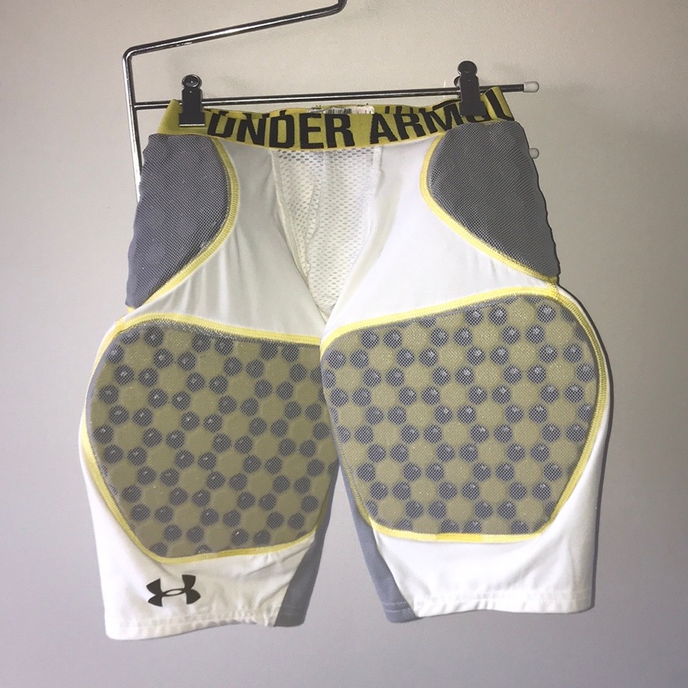 Football padding under armour